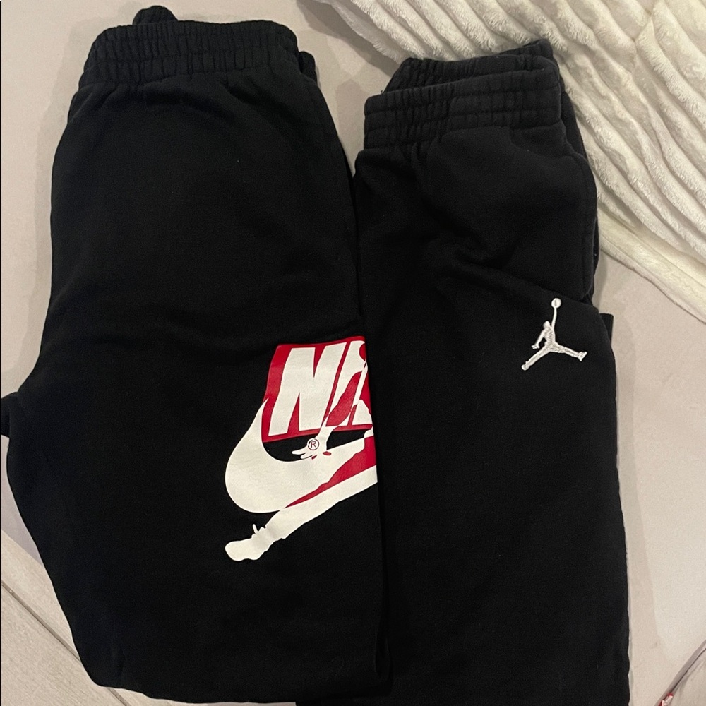 Nike Kids Black Joggers with Red Logo